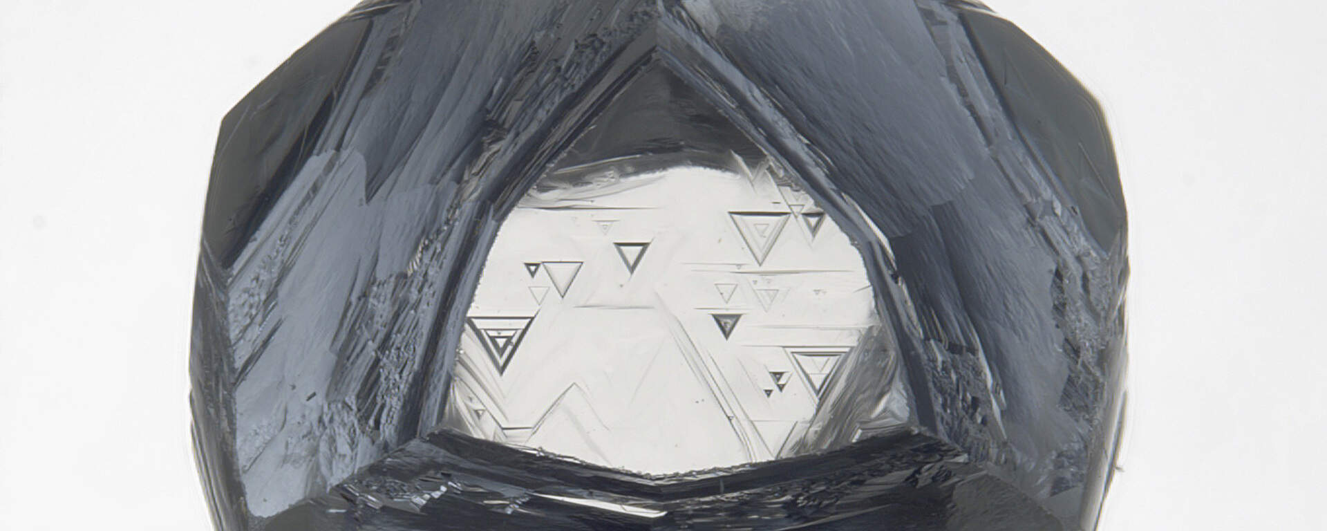 Partially etched diamond crystal