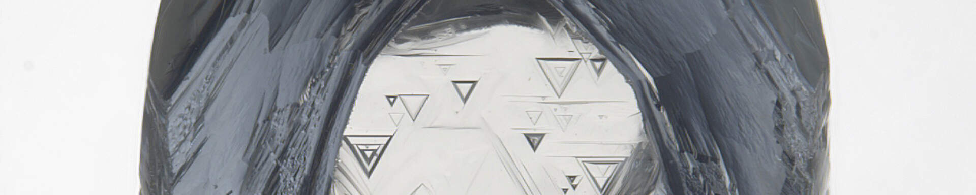 Partially etched diamond crystal