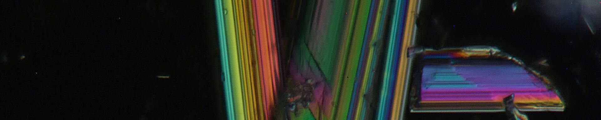 Dumortierite in rock crystal, Brazil, polarised light